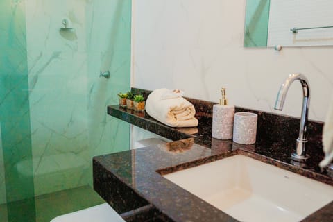 Family Double Room, Air conditioning | Bathroom | Shower, hair dryer, towels, soap