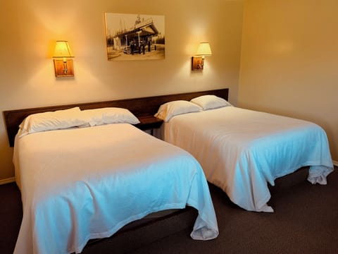 Basic Single Room, 2 Double Beds, City View | Free WiFi