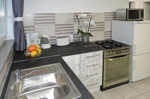 Apartment | Private kitchen | Electric kettle, toaster, highchair