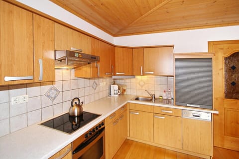 Apartment | Private kitchen | Stovetop, electric kettle, toaster, highchair