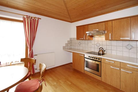 Apartment | Private kitchen | Stovetop, electric kettle, toaster, highchair