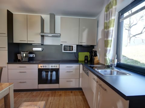 Chalet | Private kitchen | Electric kettle, toaster, highchair