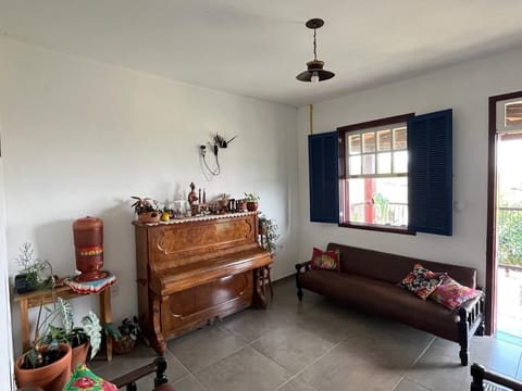 Basic Quadruple Room, Private Bathroom, Courtyard View | Living room