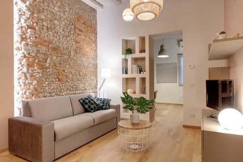 Apartment | Living area | 23-inch flat-screen TV with digital channels