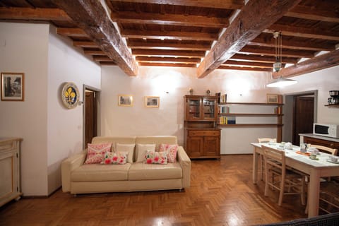 Apartment | Living area | 24-inch flat-screen TV with digital channels, DVD player