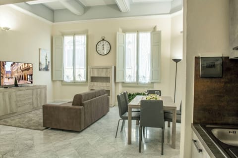 Apartment | Living area | 24-inch flat-screen TV with digital channels