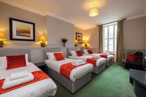 Quadruple Room, City View | Iron/ironing board, free WiFi, bed sheets