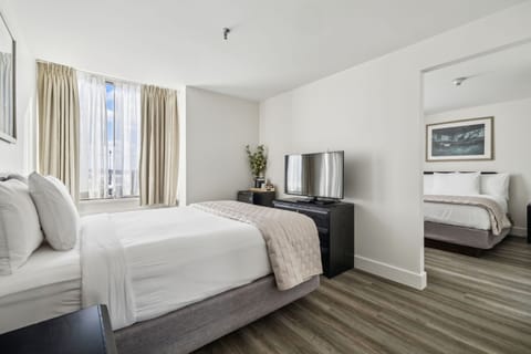 Deluxe Two Queen Suite | Individually furnished, desk, laptop workspace, blackout drapes