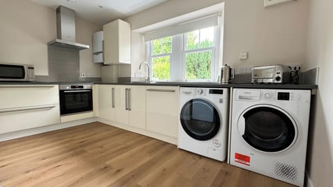 Apartment, 2 Bedrooms | Private kitchen | Fridge, microwave, oven, dishwasher