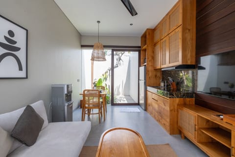 Villa, 1 Bedroom, Pool View | Living area | 50-inch flat-screen TV with digital channels