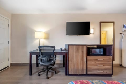 Desk, blackout drapes, iron/ironing board, cribs/infant beds