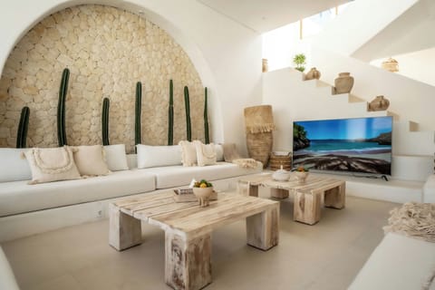 Exclusive Villa, Patio, Pool View | Living area | 75-inch Smart TV with cable channels