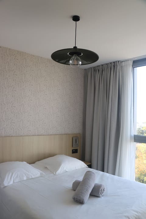 Standard Double Room | Premium bedding, individually furnished, desk, laptop workspace