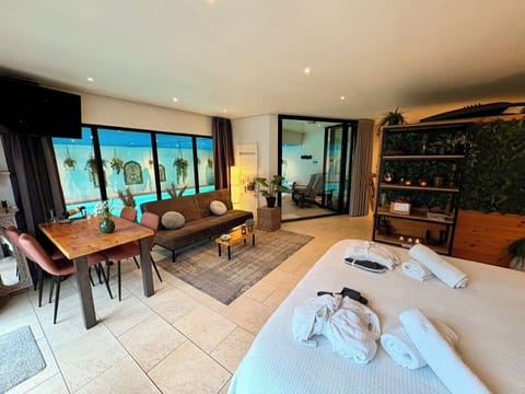 Deluxe Bungalow, Private Pool, Garden View | 1 bedroom, blackout drapes, soundproofing, iron/ironing board