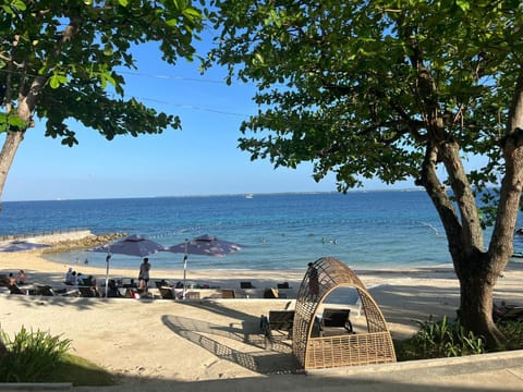 Private beach, white sand, beach shuttle, beach bar