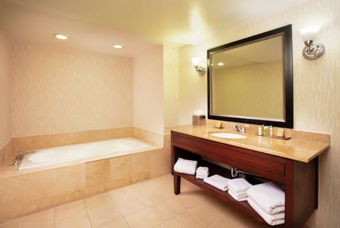 Superior Suite, 1 King Bed with Sofa bed | Bathroom | Eco-friendly toiletries, hair dryer, towels, soap
