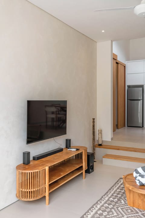 Deluxe Villa, Pool View | Living area | Flat-screen TV