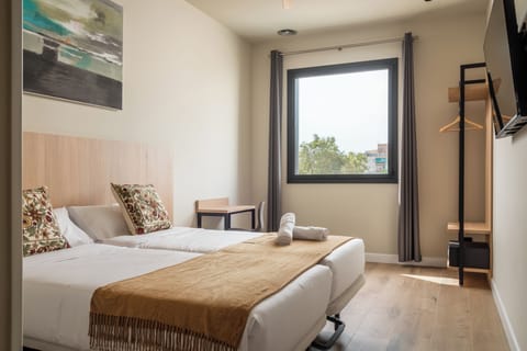 Comfort Twin Room, Non Smoking | In-room safe, blackout drapes, soundproofing, iron/ironing board