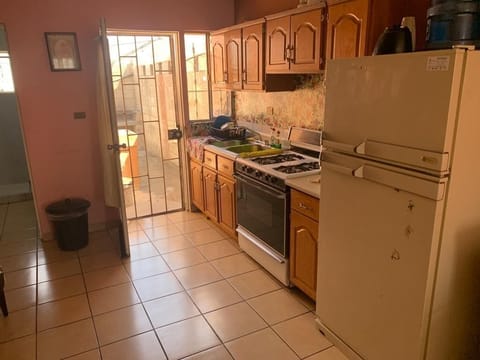 Fridge, microwave, oven, cookware/dishes/utensils