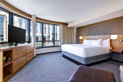 Desk, laptop workspace, iron/ironing board, free cribs/infant beds