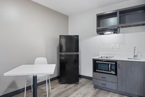 Studio, 1 Queen Bed, Non Smoking | Private kitchenette | Full-size fridge, microwave, stovetop