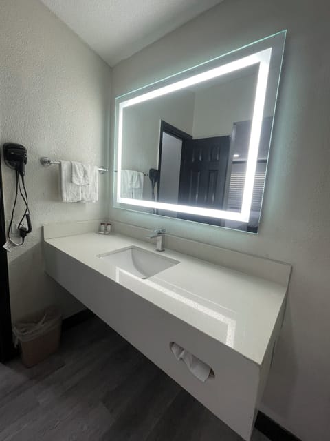 Hair dryer, towels, soap, shampoo