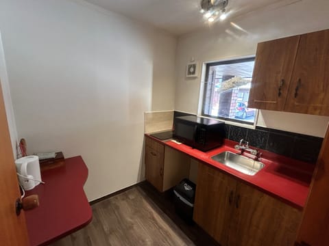 Comfort Studio | Private kitchen | Full-size fridge, microwave, stovetop, cookware/dishes/utensils