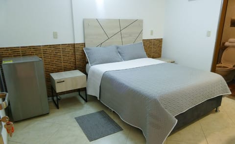 Double Room, City View | Desk, laptop workspace, iron/ironing board, free WiFi