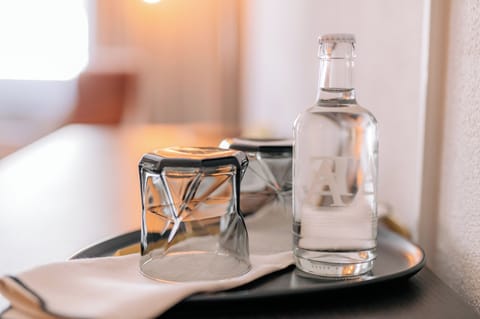 Hypo-allergenic bedding, down comforters, Tempur-Pedic beds, minibar