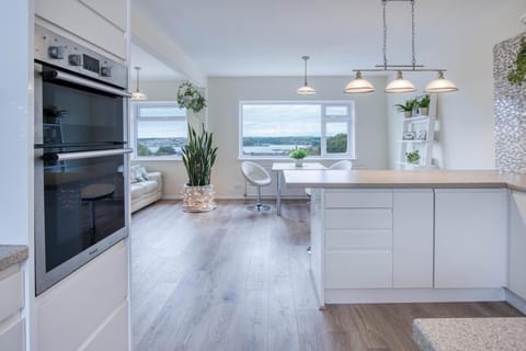 Microwave, oven, electric kettle, dining tables
