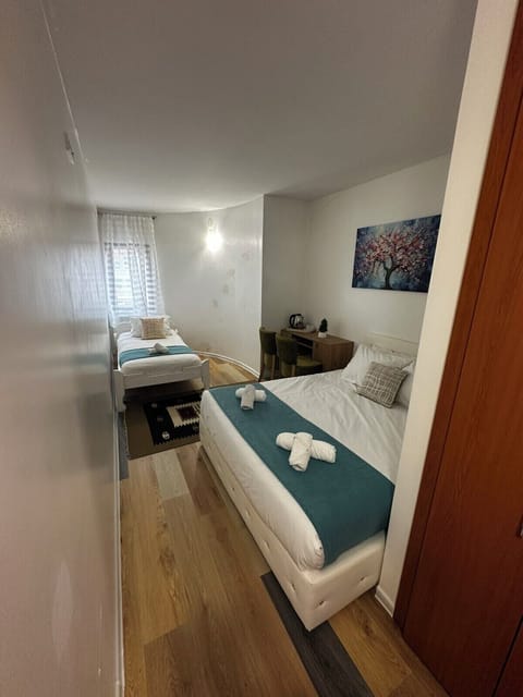 Economy Triple Room | Premium bedding, desk, laptop workspace, iron/ironing board