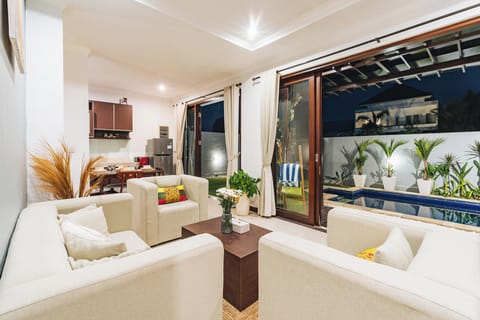 Deluxe Villa, Garden View | Living area | Flat-screen TV