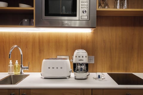 Superior Suite, City View | Private kitchen | Mini-fridge, coffee/tea maker, electric kettle