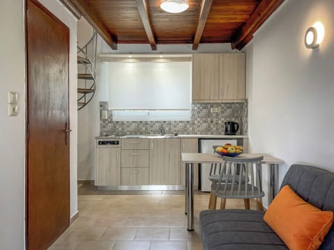 Mini-fridge, stovetop, cookware/dishes/utensils