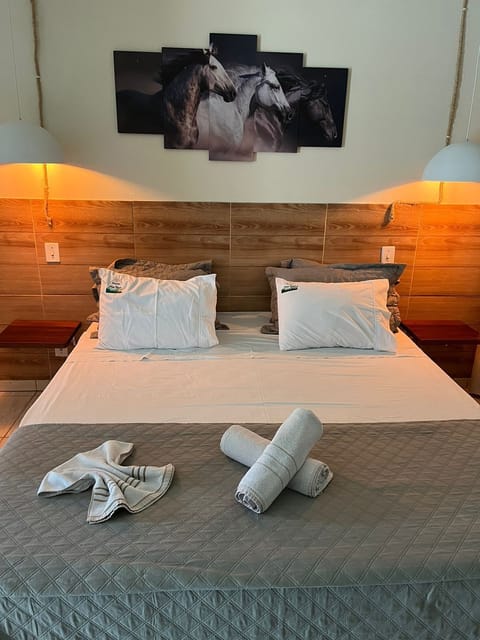 Deluxe Suite, Jetted Tub, Garden View | Desk, laptop workspace, free WiFi, bed sheets