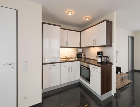 Apartment | Private kitchen | Electric kettle, toaster, highchair