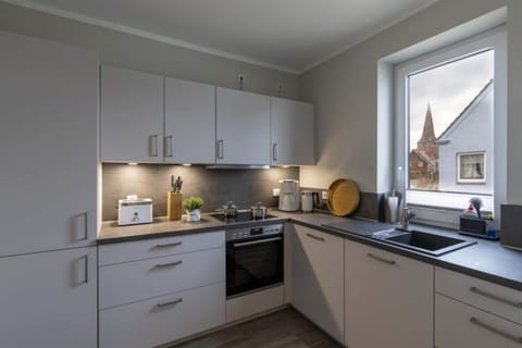Apartment | Private kitchen | Electric kettle, toaster, highchair