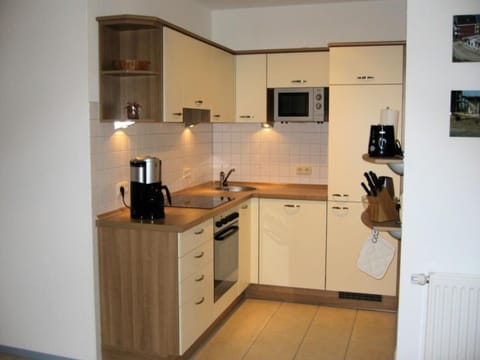 Apartment | Private kitchen | Electric kettle, toaster, highchair