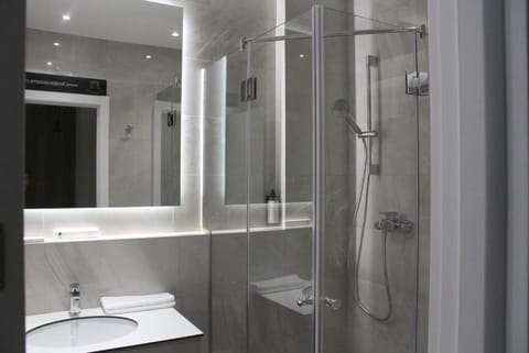 Standard Double Room | Bathroom | Shower, free toiletries, hair dryer, slippers