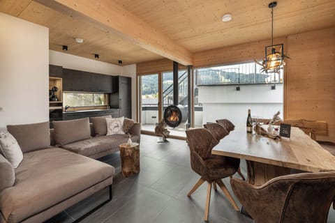 Family House, 3 Bedrooms, Sauna, Mountain View | Living area | 100-cm flat-screen TV with digital channels, heated floors, offices