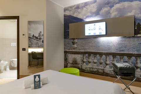 Economy Double Room, Non Smoking | In-room safe, desk, iron/ironing board, free WiFi