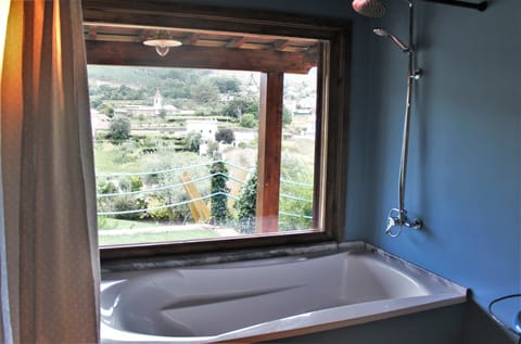 Deluxe Studio Suite, 1 Bedroom, Sauna, Pool View | Deep soaking bathtub