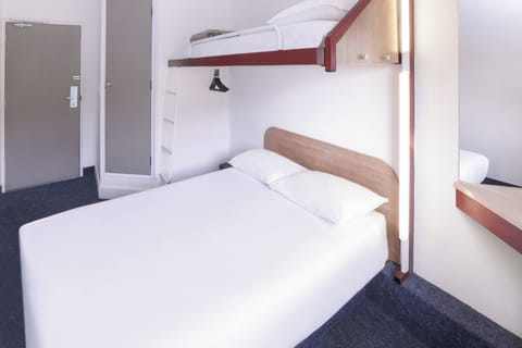 Desk, laptop workspace, free WiFi, bed sheets