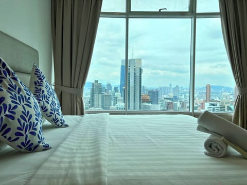 Two Bedrooms Apartment | Desk, blackout drapes, iron/ironing board, free rollaway beds