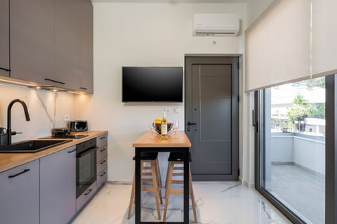 Deluxe Apartment, 2 Bedrooms, Beachside | Private kitchen | Oven, stovetop, electric kettle, toaster