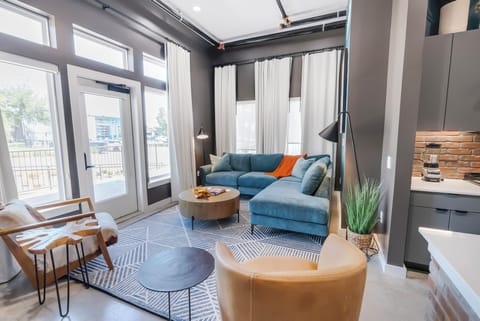 Premium Suite, 2 Queen Beds | Living area | LED TV