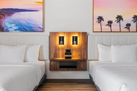 Desk, laptop workspace, iron/ironing board, travel crib