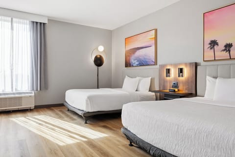 Desk, laptop workspace, iron/ironing board, travel crib