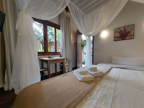 Economy Suite, 1 Queen Bed, Non Smoking, Air conditioning | Free WiFi, bed sheets