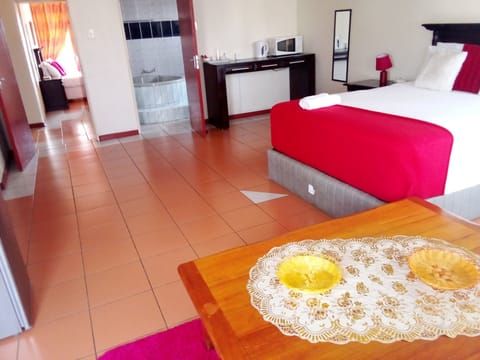 Superior Suite, Pool View | Desk, laptop workspace